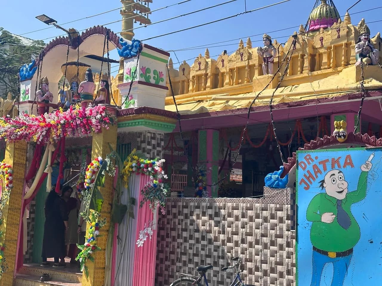 Exterior of Sri Venkateswara Swamy Temple at Rail Bazaar, Alipurduar, showing the decorated gateway and roofline